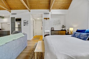 An angle from bed to the bathroom