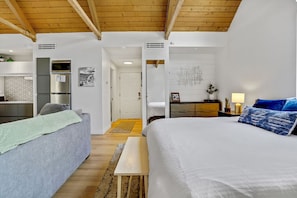 An angle from bed to the bathroom