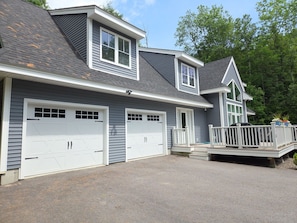 Side view front deck
big driveway..