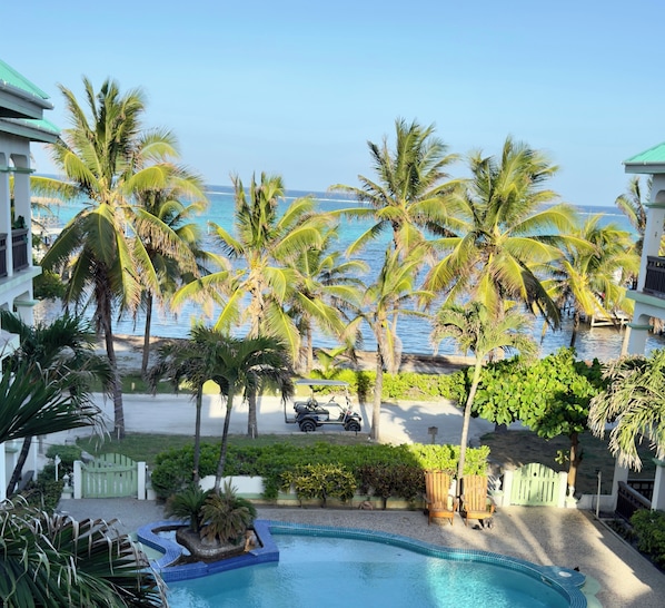 View from balcony overlooking pool and Boca Del Rio Beach