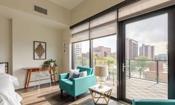 Enjoy the view from the large private balcony and sun drenched room