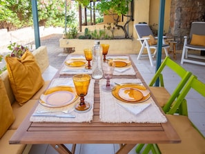 Furniture, Table, Chair, Interior Design, Kitchen & Dining Room Table, Tableware, Dining Room, Restaurant, Tablecloth, Outdoor Table