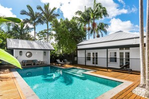 Dive into the sparkling magnesium pool or unwind poolside under the shade of the guest pavilion—designed for ultimate relaxation and tropical living.