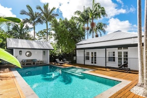 Dive into the sparkling magnesium pool or unwind poolside under the shade of the guest pavilion—designed for ultimate relaxation and tropical living.