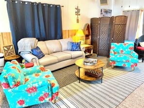 Living room: sofa bed (full), comfortable chairs