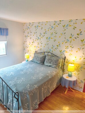 Bedroom 1 queen size, double closets, window a/c, tv with local channels