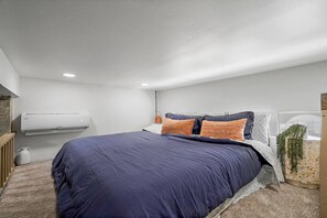 Sleeping loft with king size bed