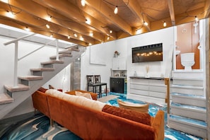 Living room with smart tv and couch (2)