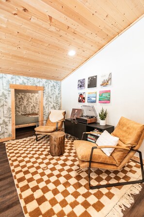 Featuring an open concept living space with record player and ultimate comfort!