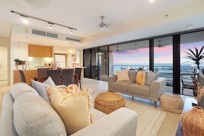 Lounge area that opens onto balcony.