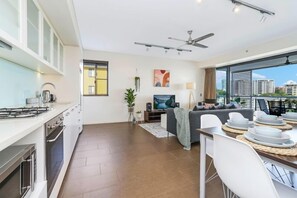 Entrance through to kitchen, living and dining.