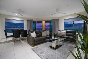 Lounge in style, leather couches and open plan living.