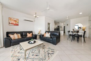 Spacious and open plan living, dining and kitchen areas.