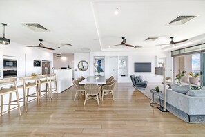 Open plan living, dining and kitchen.