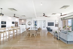 Open plan living, dining and kitchen.