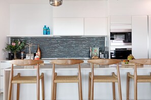 Breakfast bar seating at the kitchen.