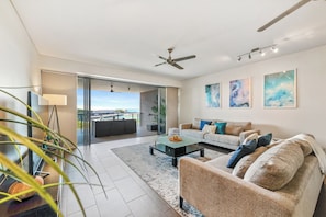 Open plan living, step straight out onto the balcony from the lounge area.