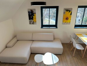 Furniture, Flooring, Interior Design, Floor, Wood, Couch, Wood Flooring, Living Room, Table, Home