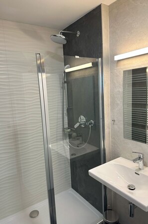 Bathroom, Plumbing Fixture, Flooring, Floor, Interior Design, Plumbing, Shower, Mirror, Tile, Shower Door