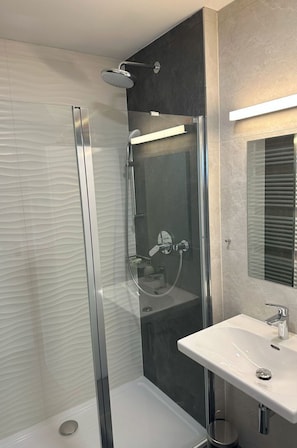 Bathroom, Plumbing Fixture, Flooring, Floor, Interior Design, Plumbing, Shower, Mirror, Tile, Shower Door