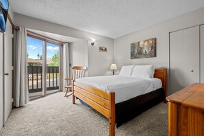Relax and recharge in this cozy queen bedroom retreat.