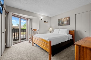 Relax and recharge in this cozy queen bedroom retreat.