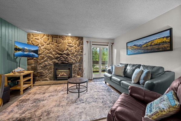 Cozy up in style- this living room is perfect for relaxation and gathering.