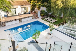 Private heated swimming pool.
