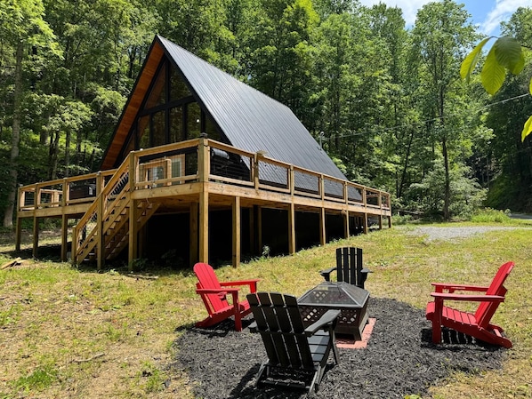Cozy A frame retreat with wrap around deck, fireplace and hot tub
