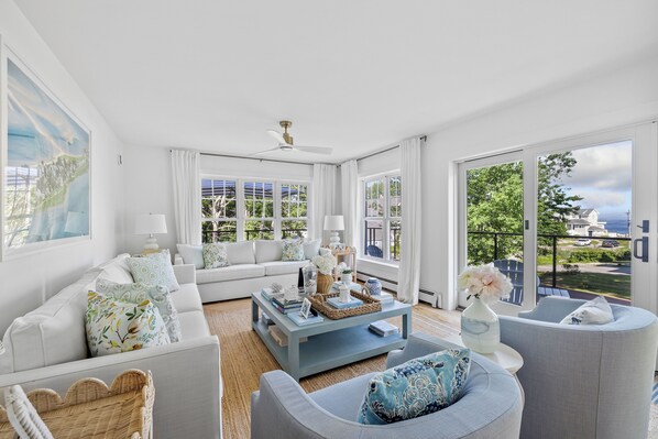 Stunning large living room with water views (1)