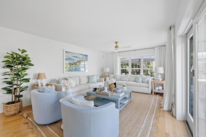 Stunning large living room with water views (3)