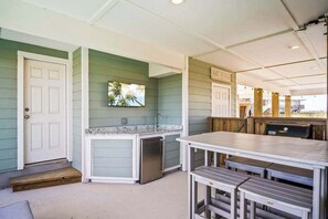 Fire up the grill, grab a cold drink from the mini fridge, and settle in for the perfect afternoon. With the TV ready for movie nights or sports, and comfy seating nearby.