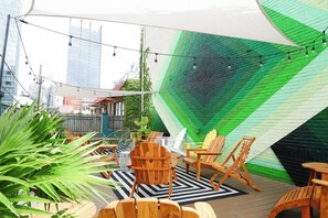 Vibrant lounge spaces and local art.