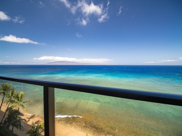Soak in the breathtaking panoramic oceanfront views from your private balcony—perfect for whale watching, sunsets, and morning coffee above Maui's golden shores.