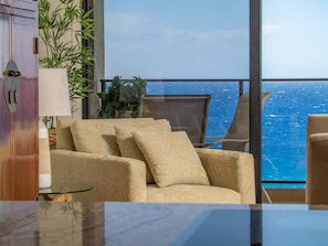 Curl up in this cozy chair with a good book and let the sound of the waves calm you in this perfectly placed nook with unobstructed ocean views.
File Name: cozy-oceanview-reading-nook-maui-condo.jpg