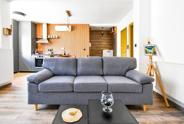 Lounge in Scandinavian comfort—perfect for movie nights, morning coffee, or a midday recharge