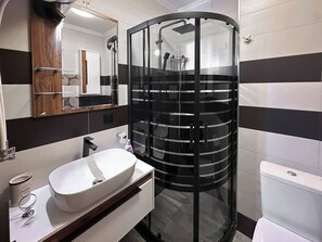 Refresh in style with a clean, modern bathroom designed for both function and comfort