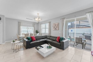 Living Room with Pool View!#Disney #Parks #kingdom #springs #StoreyLake #Apartment #Vacation #Rental #waterpark #Kissimmee #Orlando #universal #citywalk