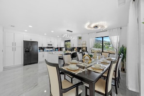 A full dining setup showcasing timeless style and perfect symmetry