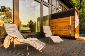 Find a private sauna located on the top deck!