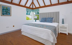 Queen Size bed, this bedroom has A/C as well as a ceiling fan.