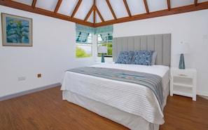 Queen Size bed, this bedroom has A/C as well as a ceiling fan.