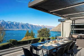 With ample space for lounging and dining, the deck is designed for entertaining in comfort and style. Enjoy unforgettable BBQs surrounded by breathtaking lake and mountain vistas.