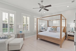 Primary Bedroom with a King bed, TV, closet, and ensuite bathroom access.