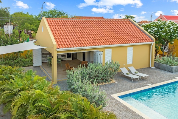 Villa Awa, located directly next to the saltwater pool at the Villa Grandi resort
