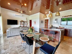 Open floor plan with well equipped kitchen and comfortable living room. 