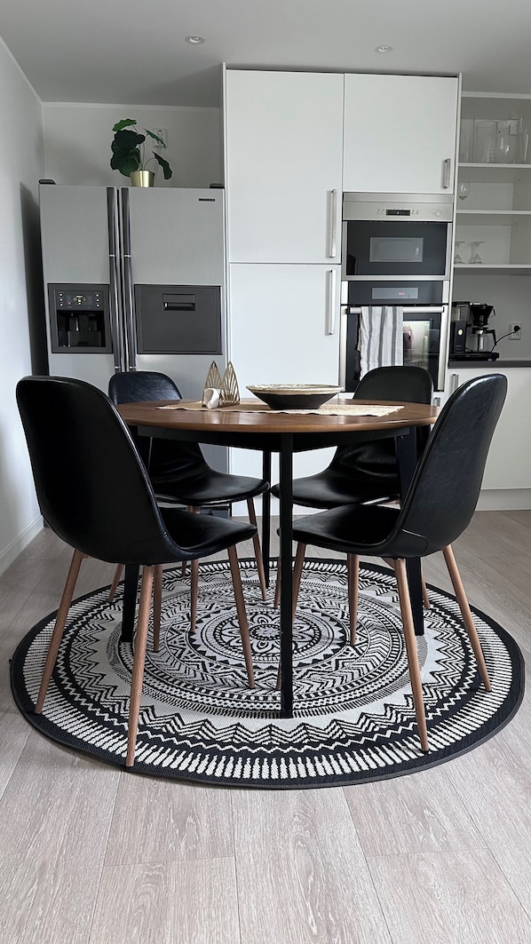 Stylish dining space with a modern touch — perfect for gathering and relaxing.