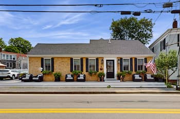 Stylish coastal retreat with modern chef's kitchen, private yard, and fire pit