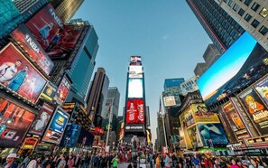 Times Square – Catch Broadway lights, shows, and excitement (3.2 mi)
