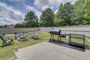 House Exterior | Patio w/ Charcoal Grill/Smoker | Fire Pit | Fenced Backyard